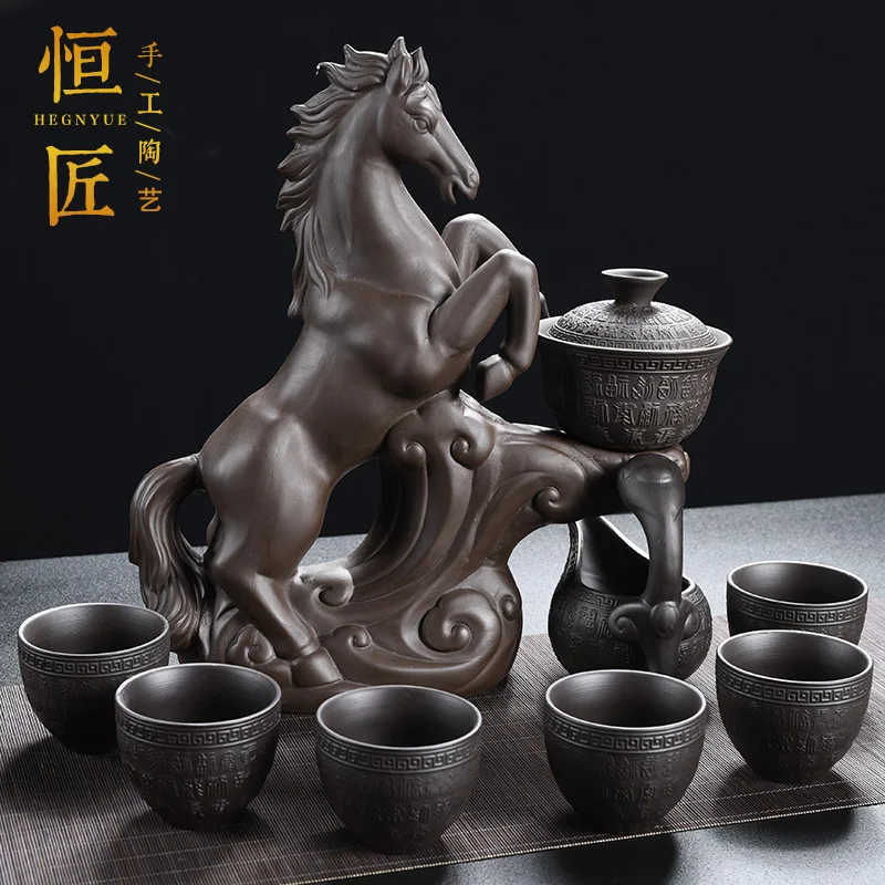 Purple sand creative stone grinding tea set Modern lazy household kung fu set stone grinding automatic tea flusher