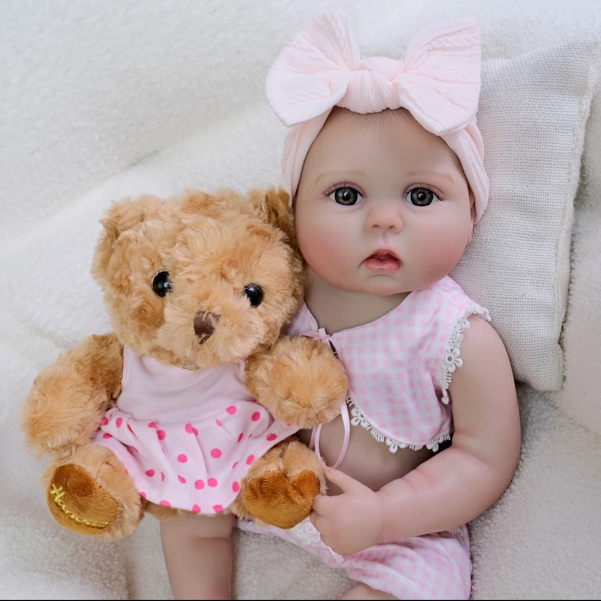 

22 inch Lucy Lifelike Toddler Reborn Doll- Poseable Arms with Joint Heat Technology Hand-Painted Baby Fat Folds Gift for Girls