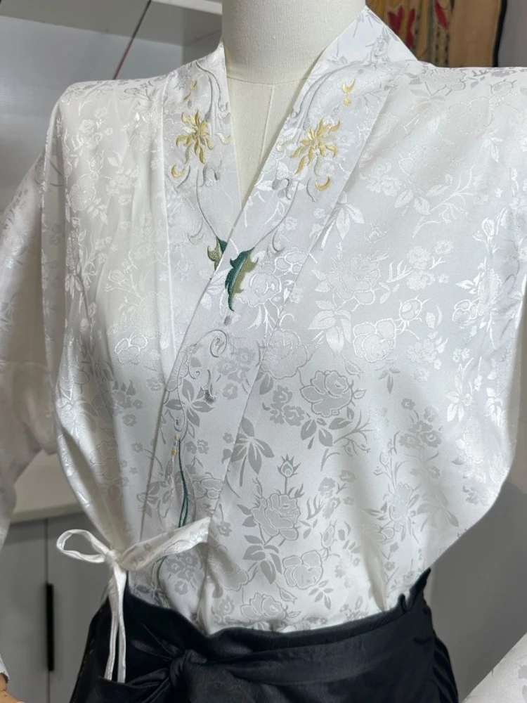 

Elegant Ming Dynasty Style Women's Hanfu Top - Embroidered Cross Collar Jacket with Airplane Sleeves Traditional Chinese Blouse