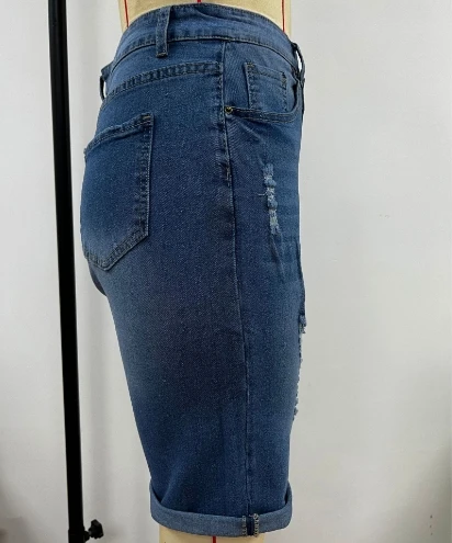 Ripped and flanged denim stretch mid length pants for women in plus size