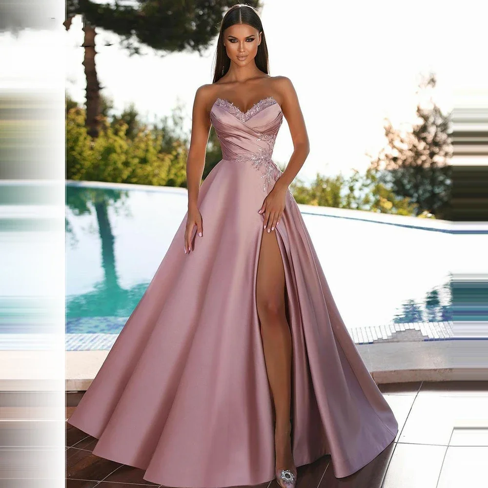 

Pink A Line Satin Long Prom Dresses Sweethearts Sleeveless Lace Applique Beads Side Slit Arabic Pleat Evening Gowns Dubai Women