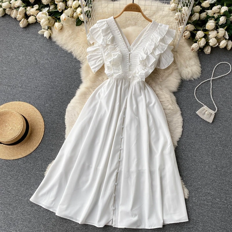 Vestido de verão de comprimento médio, retrô, nicho francês, temperamento, plissado, borda, decote em v, elegante, branco