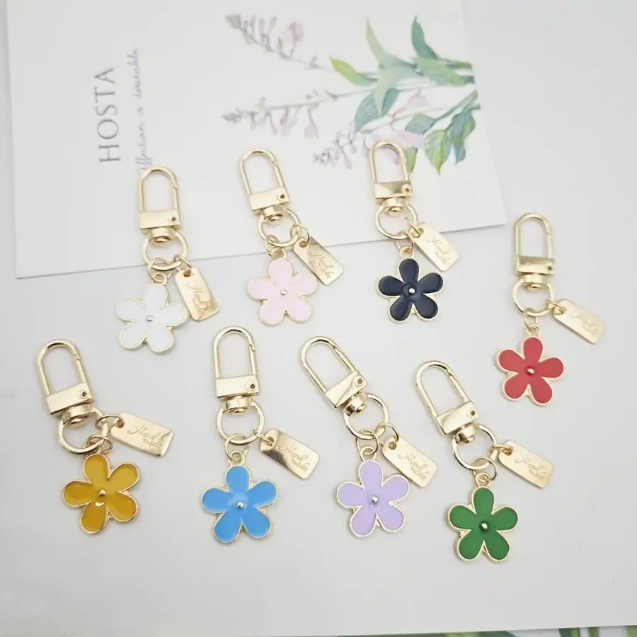1/5/10/20/50/100pcs This Colorful Small Flower Keychain Features a Bright Drip Oil Flower Shape, Outlined with Golden Edges, Whi