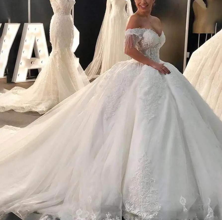 Luksusowe zroszony koronkowe suknie ślubne 2022 nowe eleganckie Off Shoulder Tulle suknie ślubne dla panny młodej Sweetheart Princess suknia ślubna