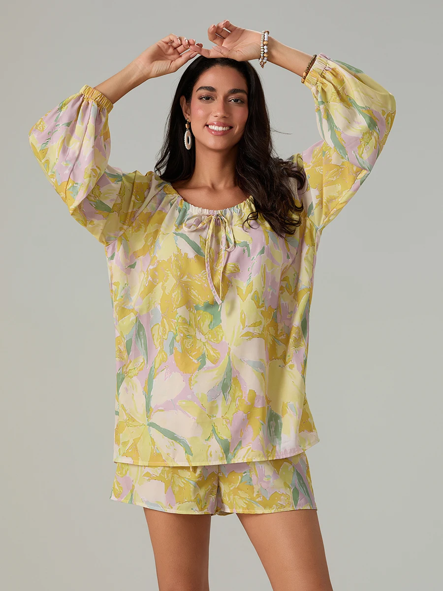 Elegant Floral Ensemble Stylish Long Sleeve Blouse with Tie-up Detail and Elastic Waist Shorts for a Chic Summer Look