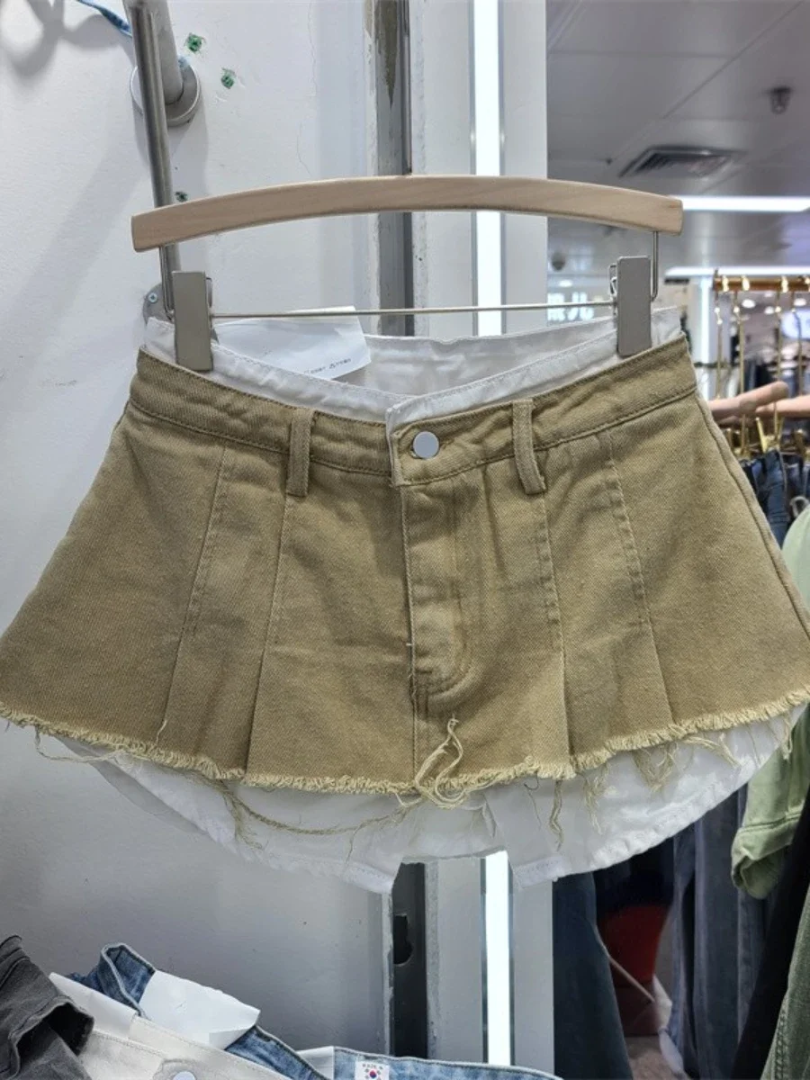 2023 frühling Retro Hohe Taille Abnehmen Unregelmäßigen Einen Schritt Mantel Kurze Denim Rock für frauen Ausgefranste Mini Rock Weibliche faldas