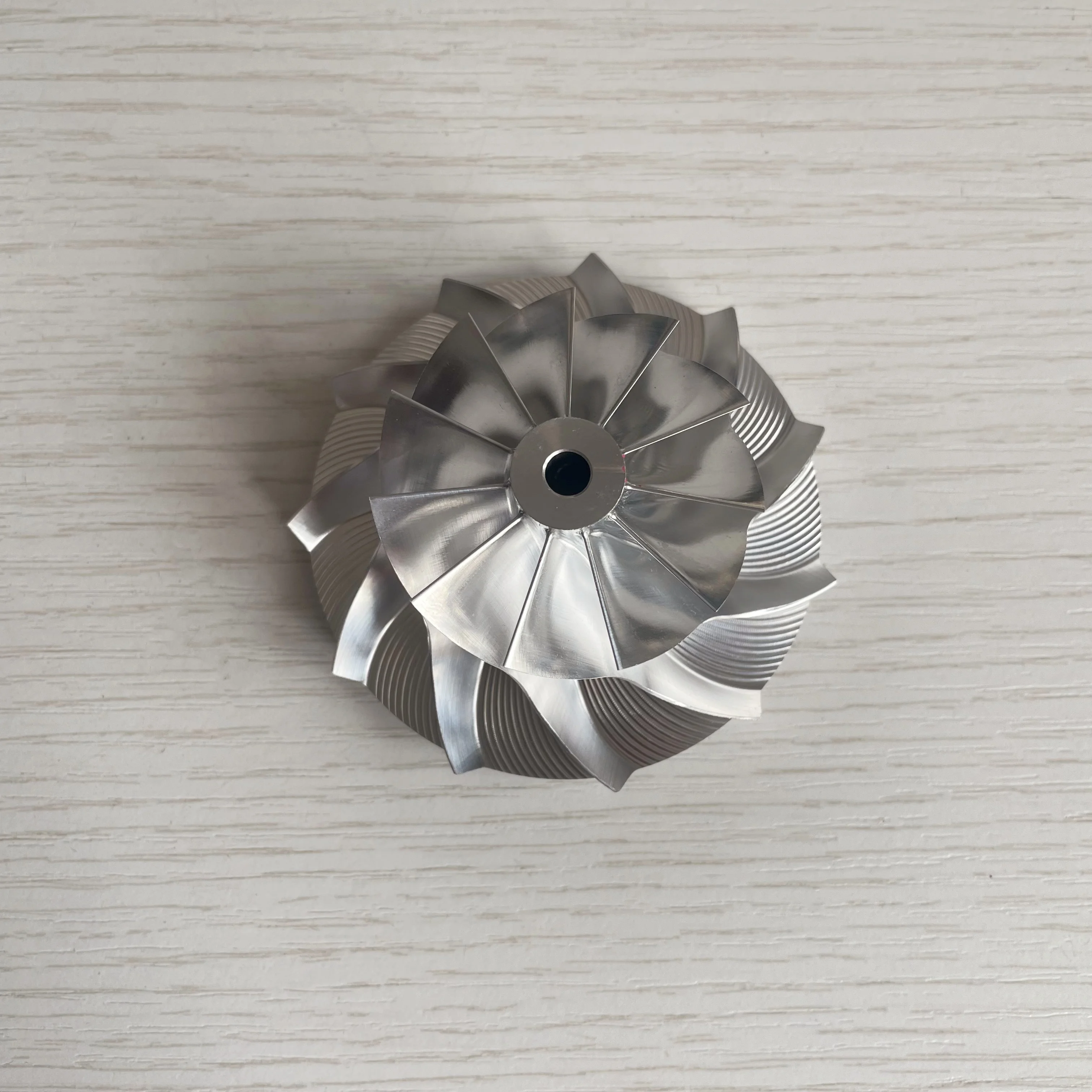 

GT15-25 45,00/69,00 мм 11 + 0 лезвий турбофрезерный/алюминий 2618/колесо компрессора заготовки