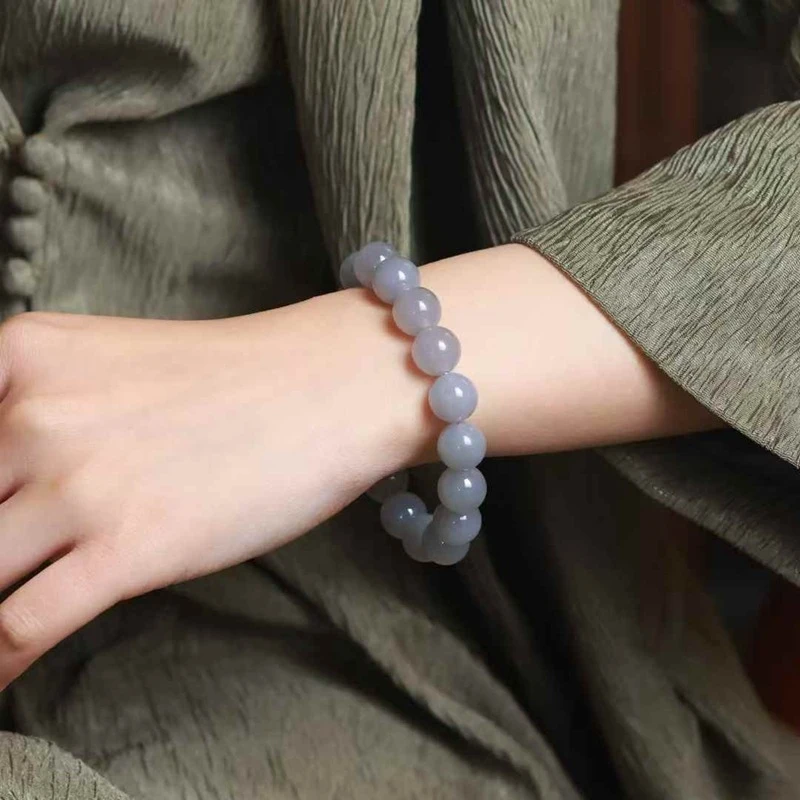 

Браслет унисекс из натурального хотанского нефрита (Цинхай), старый материал, дымчато-фиолетовый, круглые бусины, одинарная петля