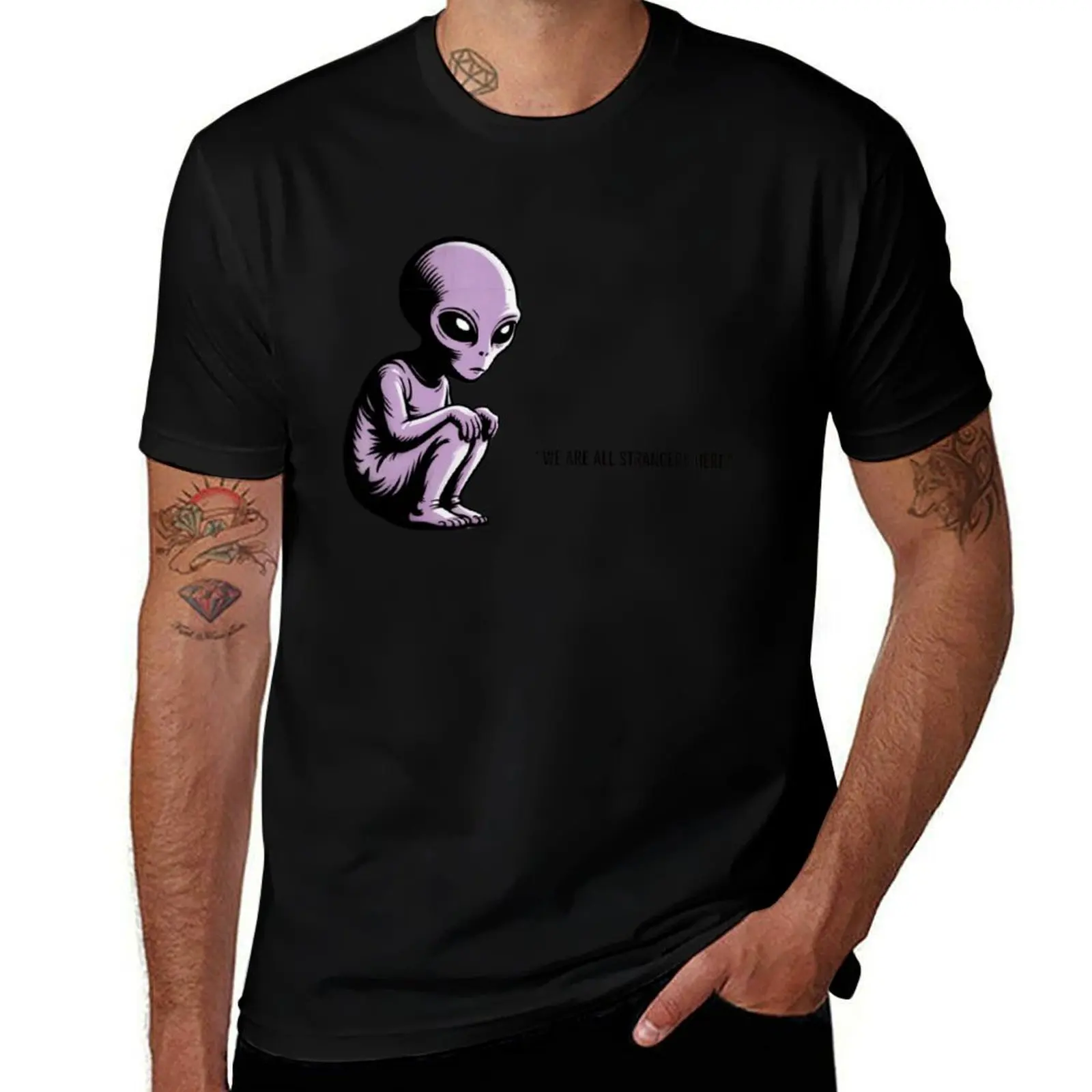 

Banksy style alien - we are all strangers here T-Shirt summer tops Funny t-shirt shirts men