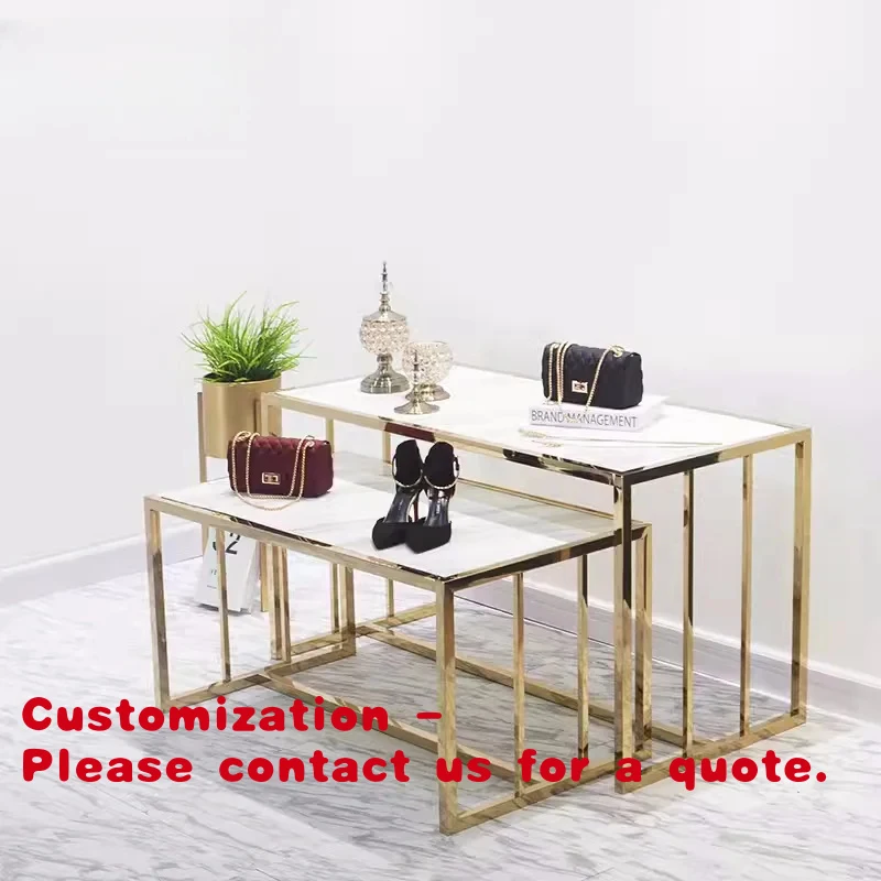 

custom.Fashion Boutique Store Design Gold Nest Table Set Clothes Rack Shop Fitting Nesting Display Table