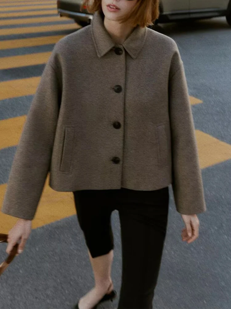 

Новая женская мода в европейском стиле, универсальное и элегантное шерстяное пальто с длинными рукавами и лацканами, короткая куртка с карманами.