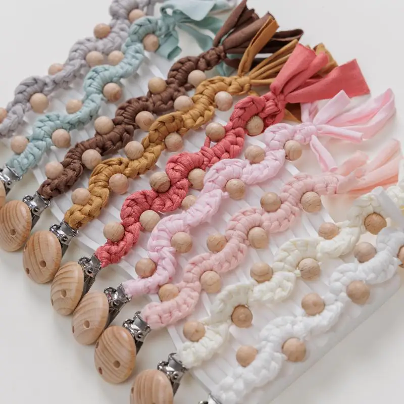 

2025 Original Baby Products: Beech wood pacifier clip for babies. Creative handmade flower cotton fabric woven pacifier chain