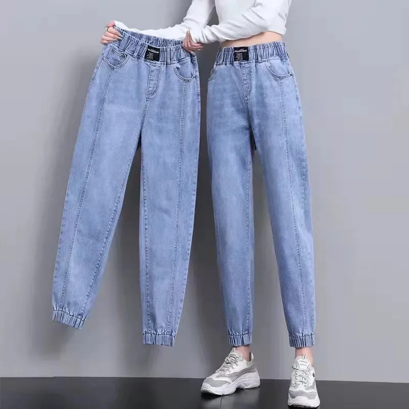 Pantalones vaqueros de mujer primavera otoño pantalones vaqueros de cintura elástica talla grande sueltos femeninos Casual Harlan de nueve puntos con pies atados pantalones ﻿