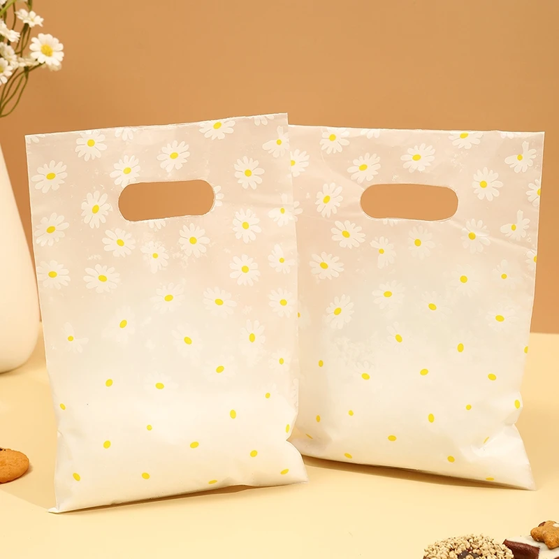100 unids/pack bolsa de regalo con estampado de margaritas con asa de plástico, bolsa de regalo de plástico, perfecta para el día de la madre, fiestas, vacaciones ;][[