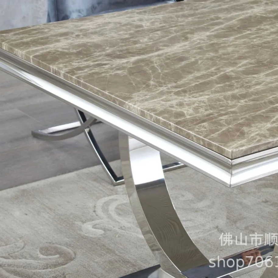 大理石のステンレス製ダイニングテーブル、モダンなミニマリストのダイニングテーブルとステンレス製の椅子