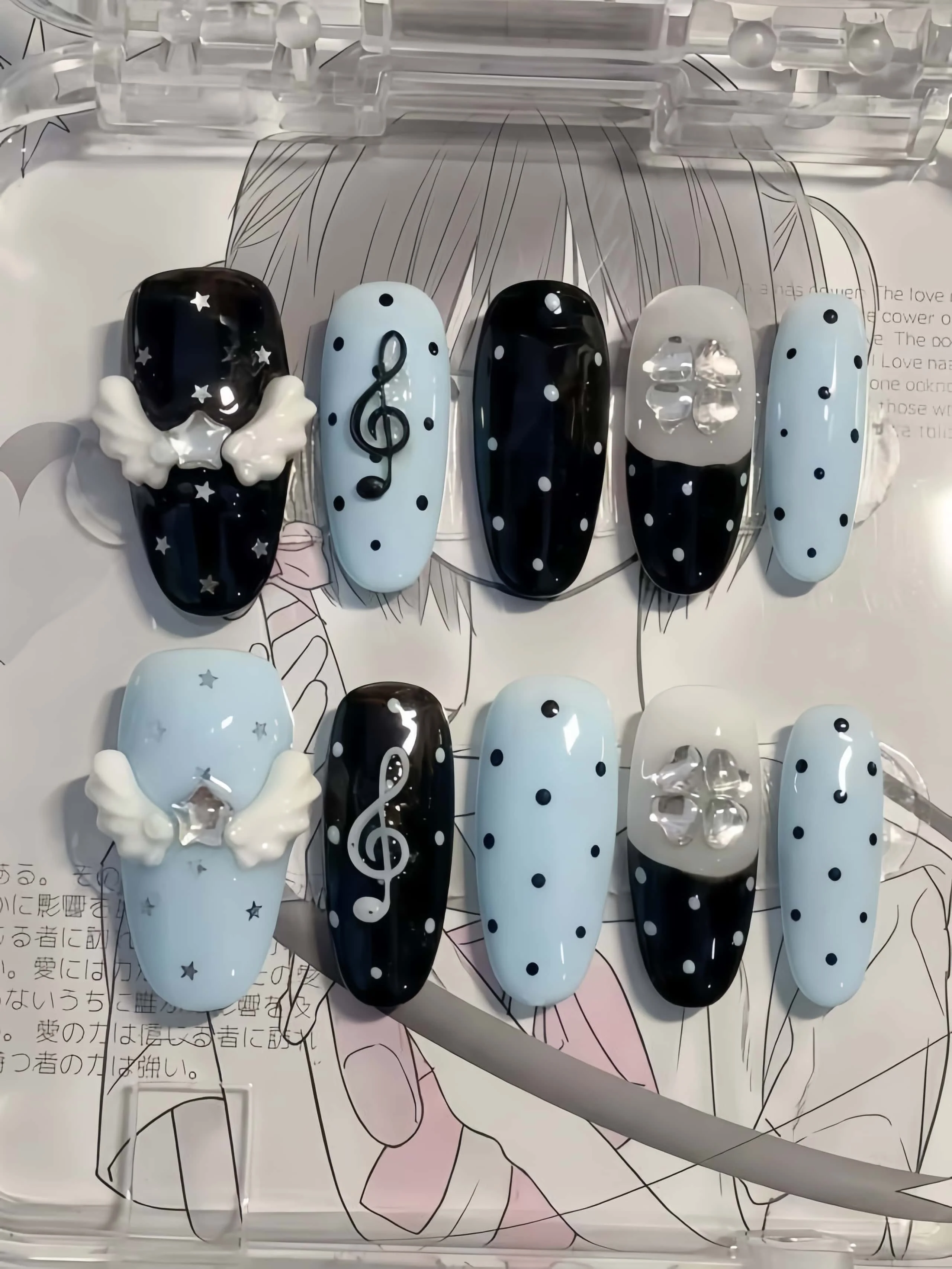 10 Pieces of Handmade Almond-Shaped Full-Cover Nail Tips, Medium-Length, with Light Blue and Black Color-Blocking Polka Dots Paired with 3D Musical Notes, Star Wings, and Transparent Flower Decorations, Y2K Sweet-Cool Style, Suitable for Women and Girls, Perfect for Summer Vacations, Graduation Season, and as a Gift, Comes with 1 Piece of Jelly Glue and 1 Nail File