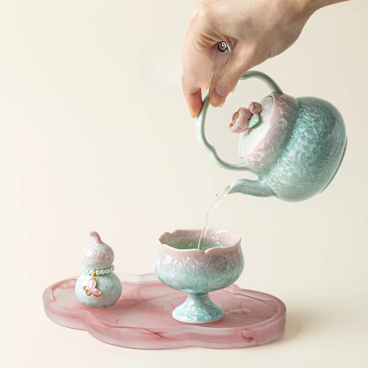 Variable crystalline glaze hand-pinched flower jacquard pot set ceramic one pot and one cup for household ladies to drink alone
