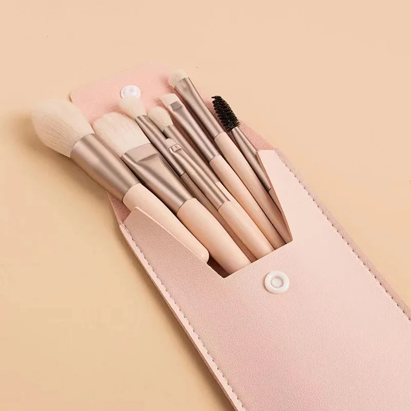 Eight-piece mini makeup brush set with leather pouch