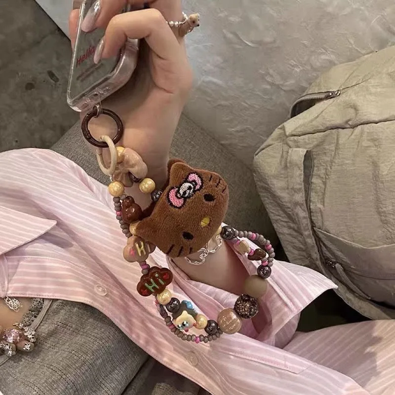 personaggio anime Hello Kitty Bracciale creativo in peluche Portachiavi Kawaii ciondolo Decorazione per imballaggio per ragazze Collegamento per cellulare