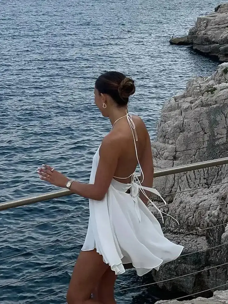 فساتين نسائية مثيرة مكشوفة الأكتاف للحفلات لعام 2025 فستان شاطئ أنيق بدون أكمام مفرغ بدون ظهر فساتين صيفية للسيدات في الشارع العالي