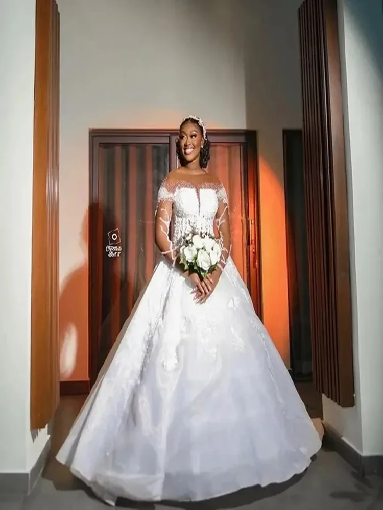 Robe de mariée personnalisée à col transparent, perles brillantes, paillettes, manches longues, avec des Appliques en dentelle africaine, robes de mariée Vintage