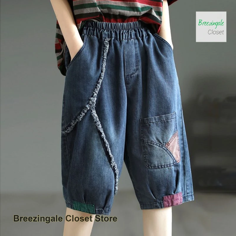 

Korean-style five-point pants with raw edge stitching patch jeans women's summer new versatile quick-drying slim high-end pants.