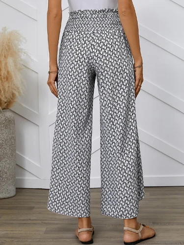 Imagen 2 del producto Pantalones largos cruzados sueltos de pierna ancha con dobladillo de tulipán y cintura con estampado completo de estilo francés para primavera/verano para mujer