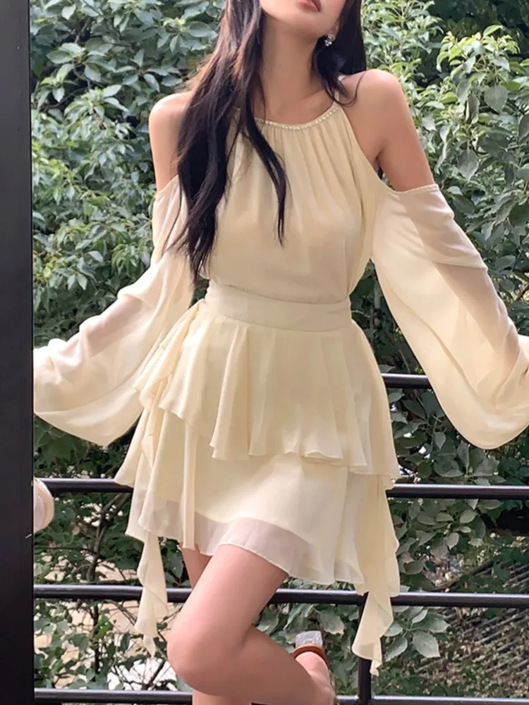 

New Elegant korean Women's 2 Pieces Sets Halther Shoulder Long Sleeves Hollow Slim Waist Top Ruffles Tassel Skirt Spring Summer