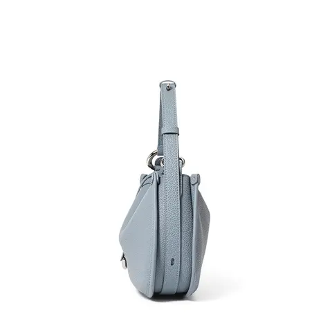 The first layer of cowhide underarm shoulder bag 2025 new niche design minimalist blue fashion soft leather hand saddle bag