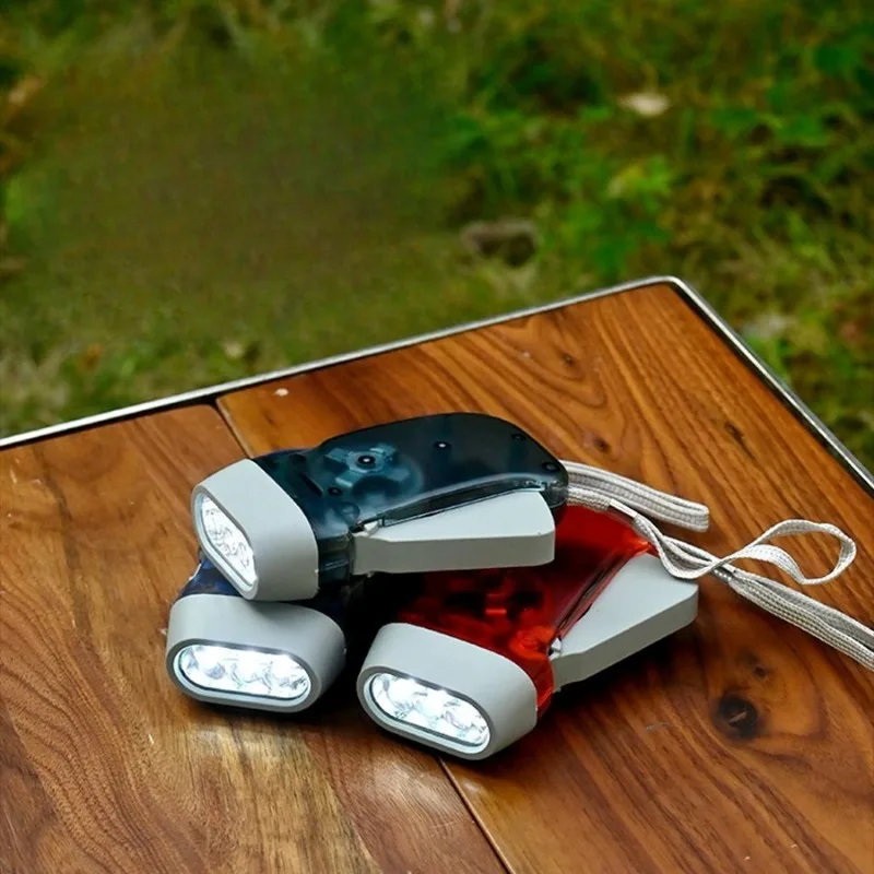Outdoor Handdruck-Automatik-Stromerzeugungs-Notfall-Taschenlampe LED-Licht Manuell Superhell Praktische Mini-Taschenlampe
