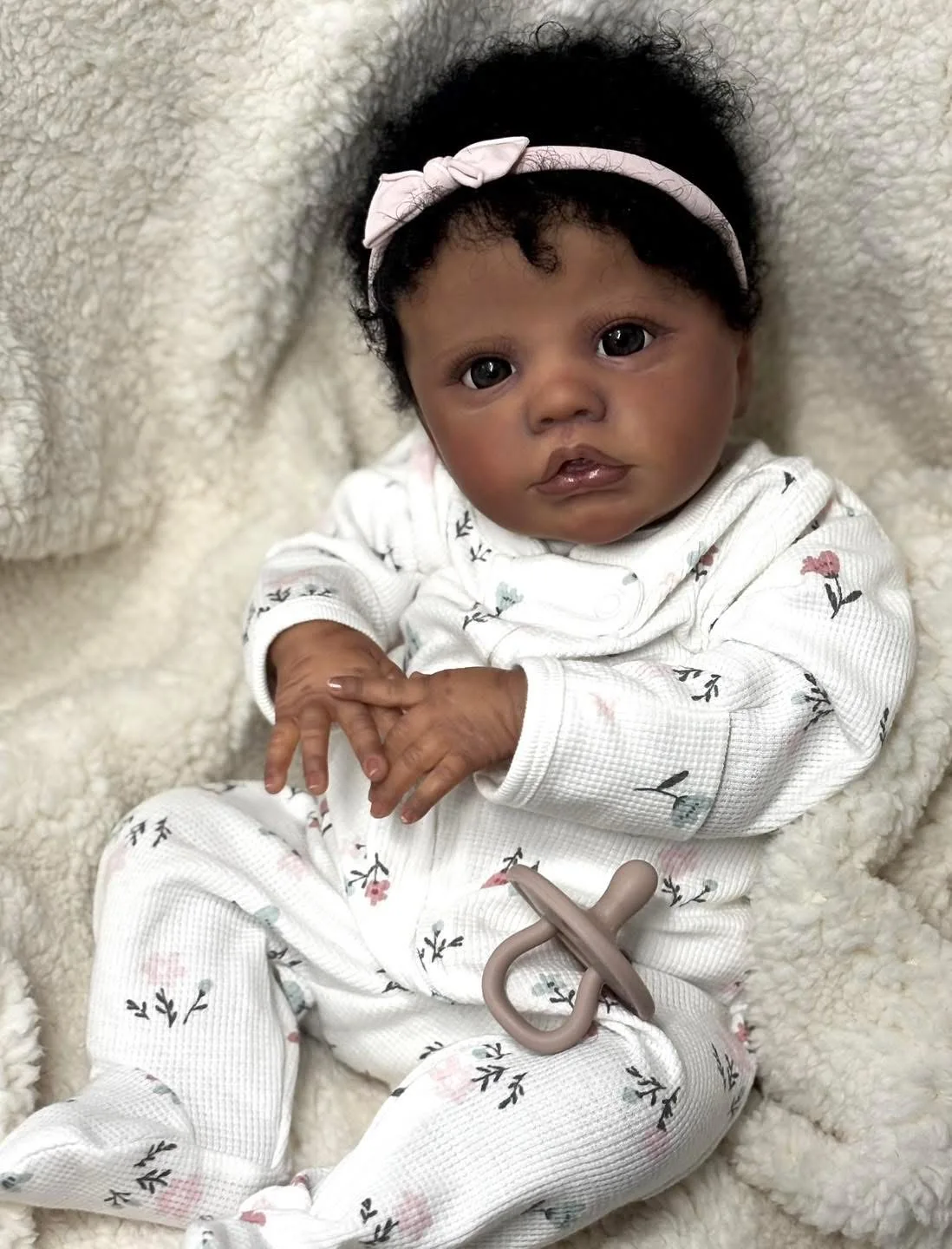 

NPK 48cm Lifelike Reborn Baby Doll Dark Skin Primrose Awake with Multi-Layer Painting And Similar Outfit Collectible Doll