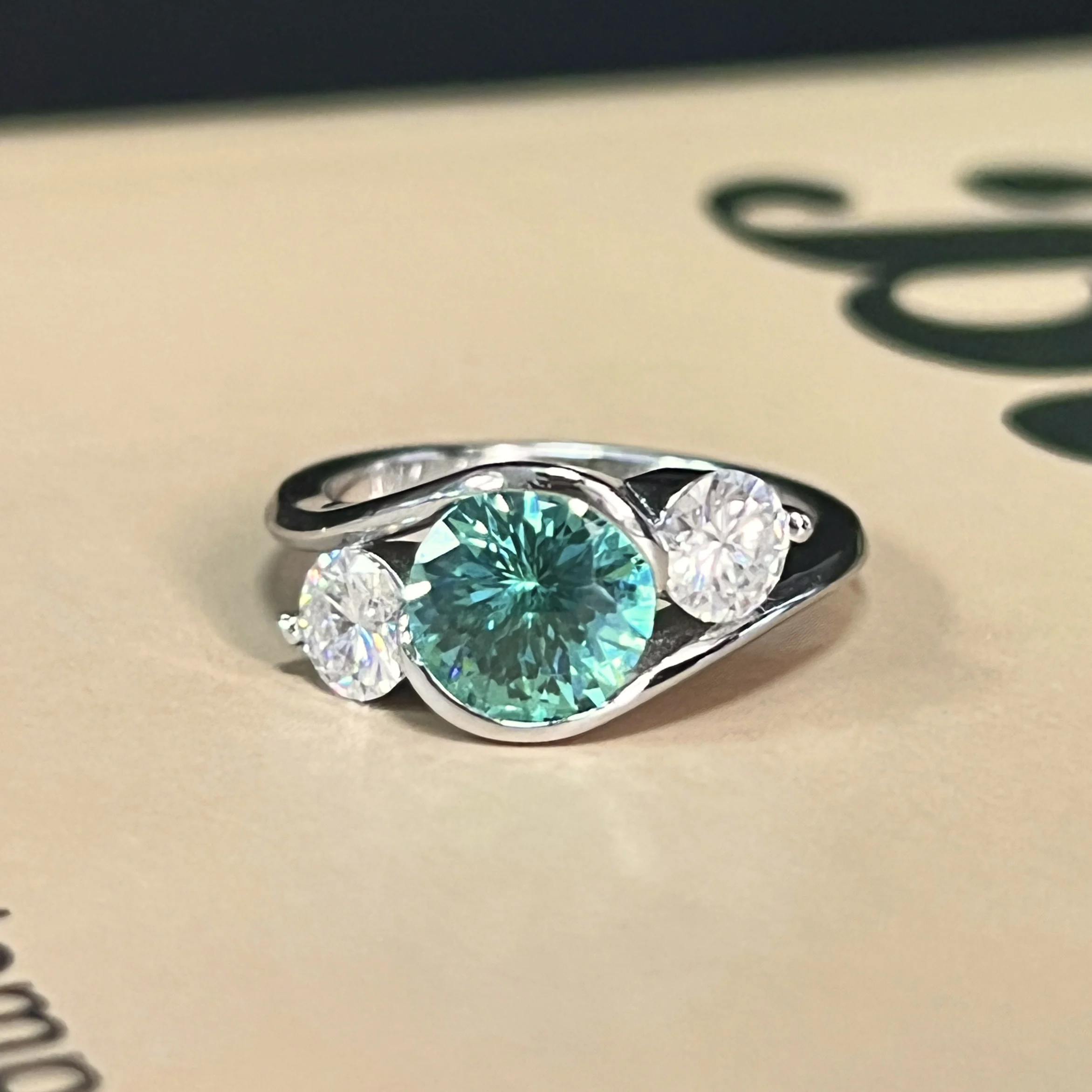 

S925 sterling silver Paraíba color ring with moissanite inlays, stylish, versatile, and elegant for women.