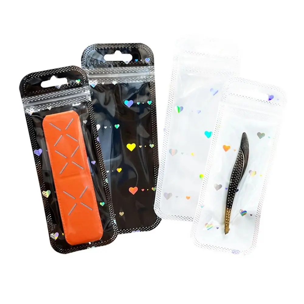 Sacchetto autosigillante in plastica semplice da 50 pezzi sacchetto di imballaggio a cuore Laser richiudibile sacchetti a chiusura lampo