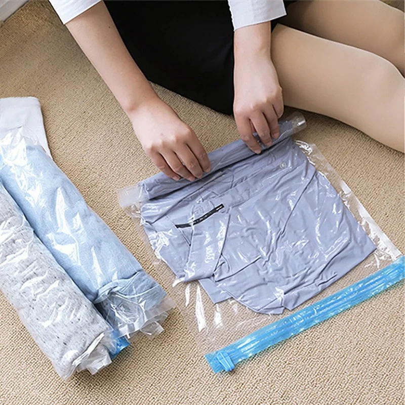 Vestiti da viaggio riutilizzabili sacchetti sottovuoto ad aria arrotolare borse di stoccaggio a compressione per valigie top pantaloni pieghevoli