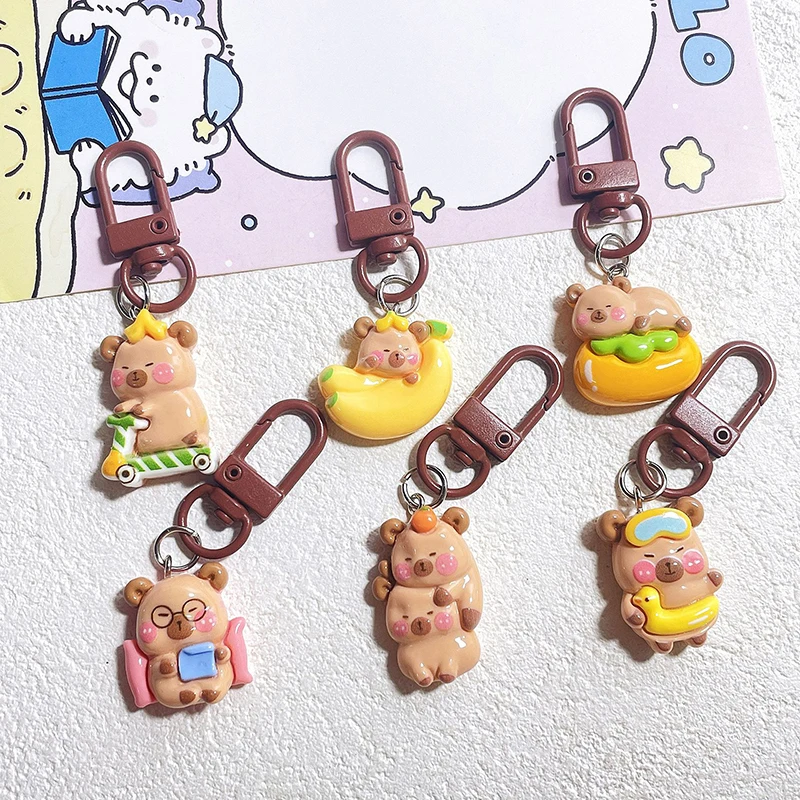 Cartoon Funny Capybara Resin Keychain Cute Animal Hug Banana Doll Keyring For Men Women Car Key Pendant Bag Jewelry Girls Gift