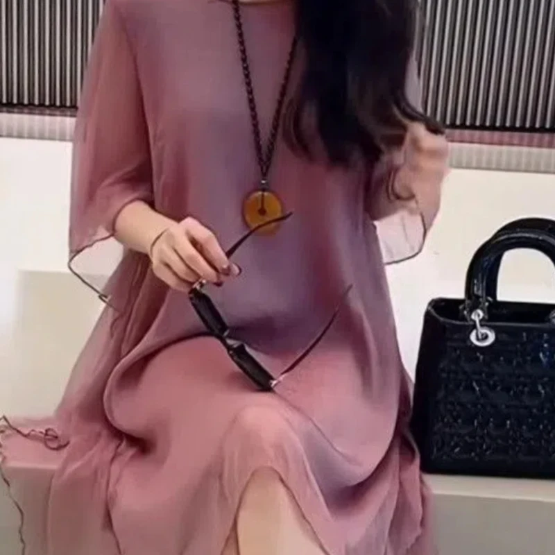 Nuevo estilo de gama alta de primavera y verano y falda básica de longitud media a la moda vestido suelto y delgado estilo diosa