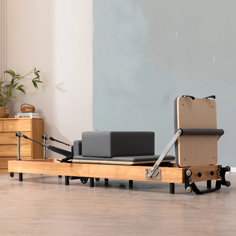 مصلح بيلاتيس عالي الجودة من خشب البلوط قابل للطي سريع الطي لليوجا معدات لياقة بدنية كبيرة سرير بيالتيس منزلي تجاري
