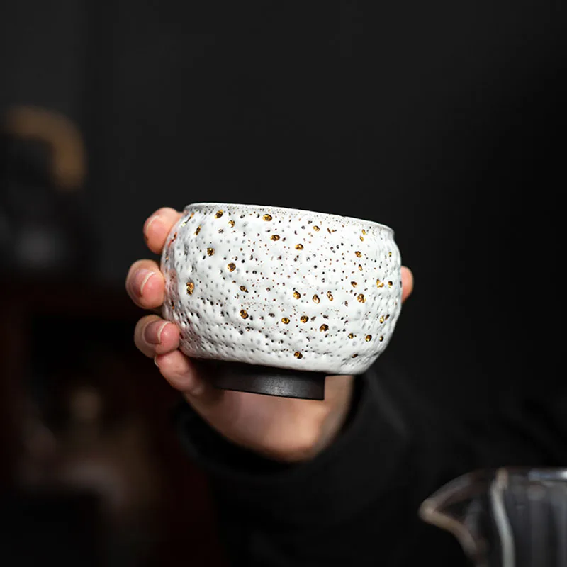 

Unique single cup of burnt pottery tea