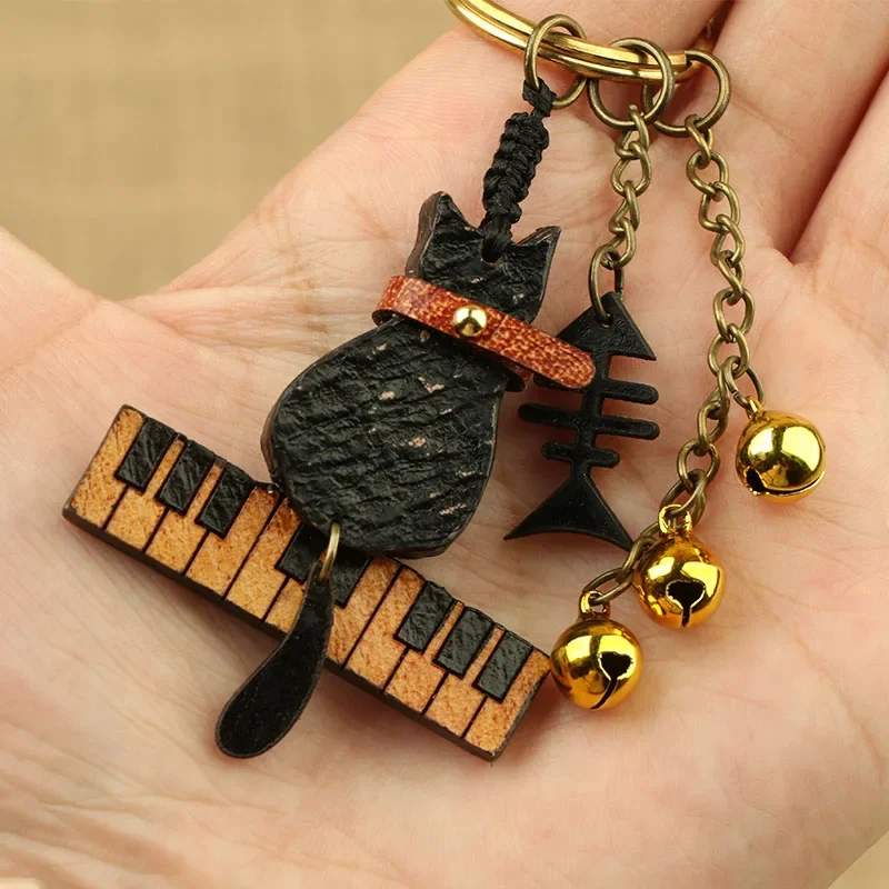 

Real cowhide leather goods,cute piano keys, cat bell ornaments, fishbone keychains,bag pendants,exquisite decorations,vintage