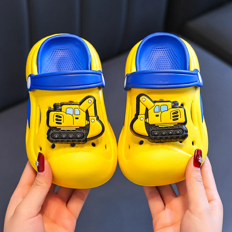 A new pair of cartoon cute excavator slippers for indoor and outdoor wear, light and comfortable summer soft soles odorless slip