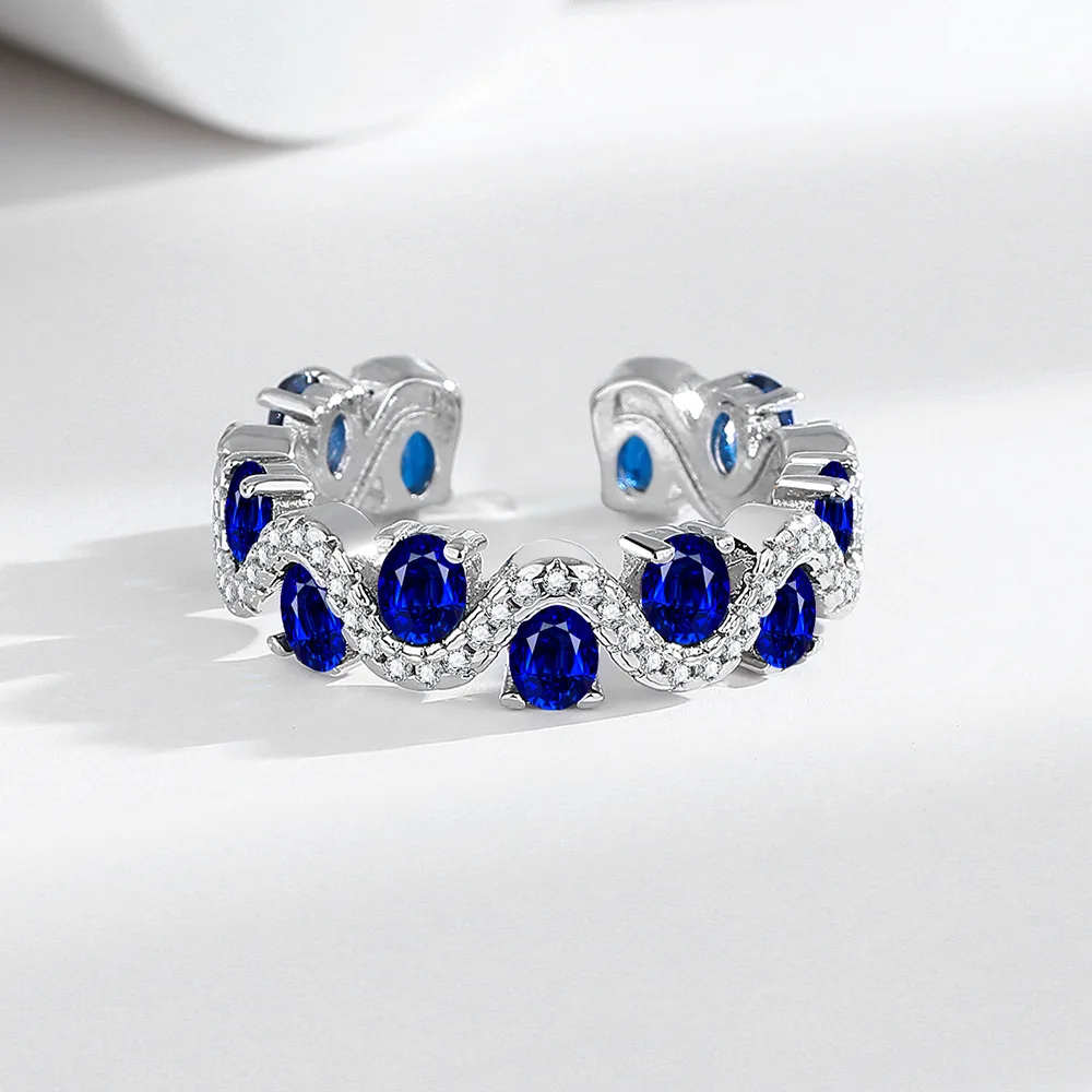ضوء الموضة الفاخرة الأزرق الإسبنيل الزركون مطعمة مع 925 فضة تصميم موجة نمط حلقة الغلاف الجوي الراقية مجوهرات