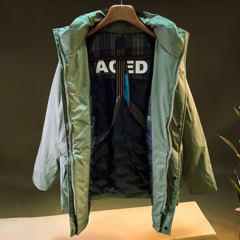 

Outdoor mountaineering cold resistant hooded workwear down jacket men's 2025 winter cold resistant warm mid length down jacket