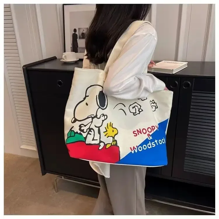 Snoopy Girl Neue niedliche Cartoon-Mode, vielseitig einsetzbar, lässig, für Reisen, leicht, große Kapazität, Aufbewahrung, tragbare Umhängetasche aus Segeltuch – Detail 15