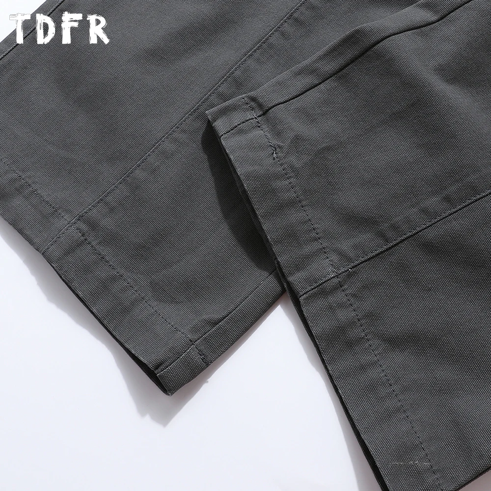 Pantalones Cargo con múltiples bolsillos para hombre, Color sólido, estilo Safari, Retro, cintura elástica, holgados, empalmados, pantalones de pierna ancha para hombre