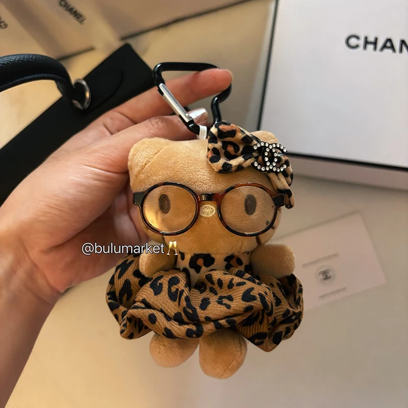 سانريو مرحبا كيتي الجلد الداكن أفخم المفاتيح Kawaii بلوشي محشوة اللعب دمية قلادة لحقيبة الظهر محفظة الفتيات حقيبة الملحقات