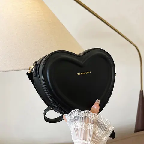 Bolso cruzado con forma de corazón para mujer, bandolera de cuero PU, Color sólido, informal, de diseñador