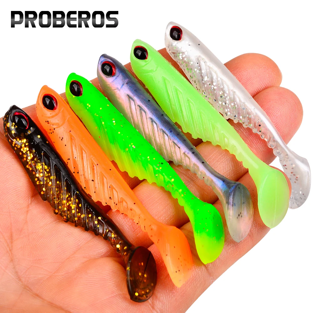 PROBEROS Señuelo de Pesca de Plástico Suave con Cola en T, 12 Unidades/Bolsa, Ojo de Pez 3D Simulado, Cebo de Natación Acanalado para Pesca de Barracuda y Lubina