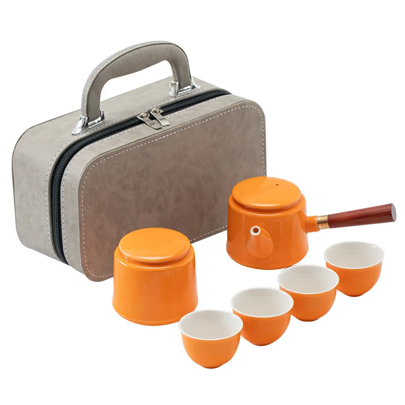 

Ceramic travel portable bag, a pot of four cups of tea cans, a complete set of kung fu sets, gifts