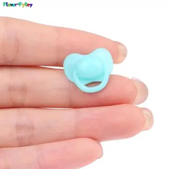 20 szt. Miniaturowa lalka pacyfikator smoczek akcesoria zabawkowe plastikowe zabawki zabawkowe lalka dla dzieci domu losowy kolor