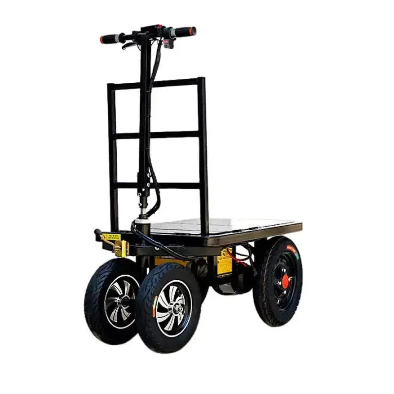 Small electric flatbed truck reverses donkey construction site to pull bricks for handling and turnover four-wheel hand push